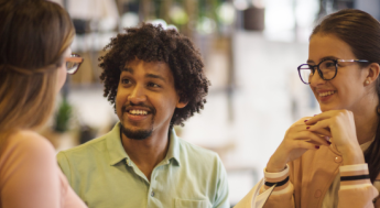 Three students in conversation