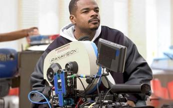 LACC Alumni, F. Gary Gray, behind a Panavision film camera on the set of The Italian Job (2003)