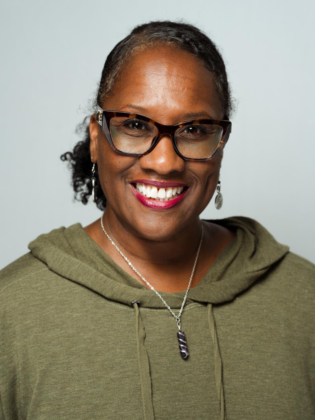 Headshot of Professor Kena Dorsey against a white backdrop