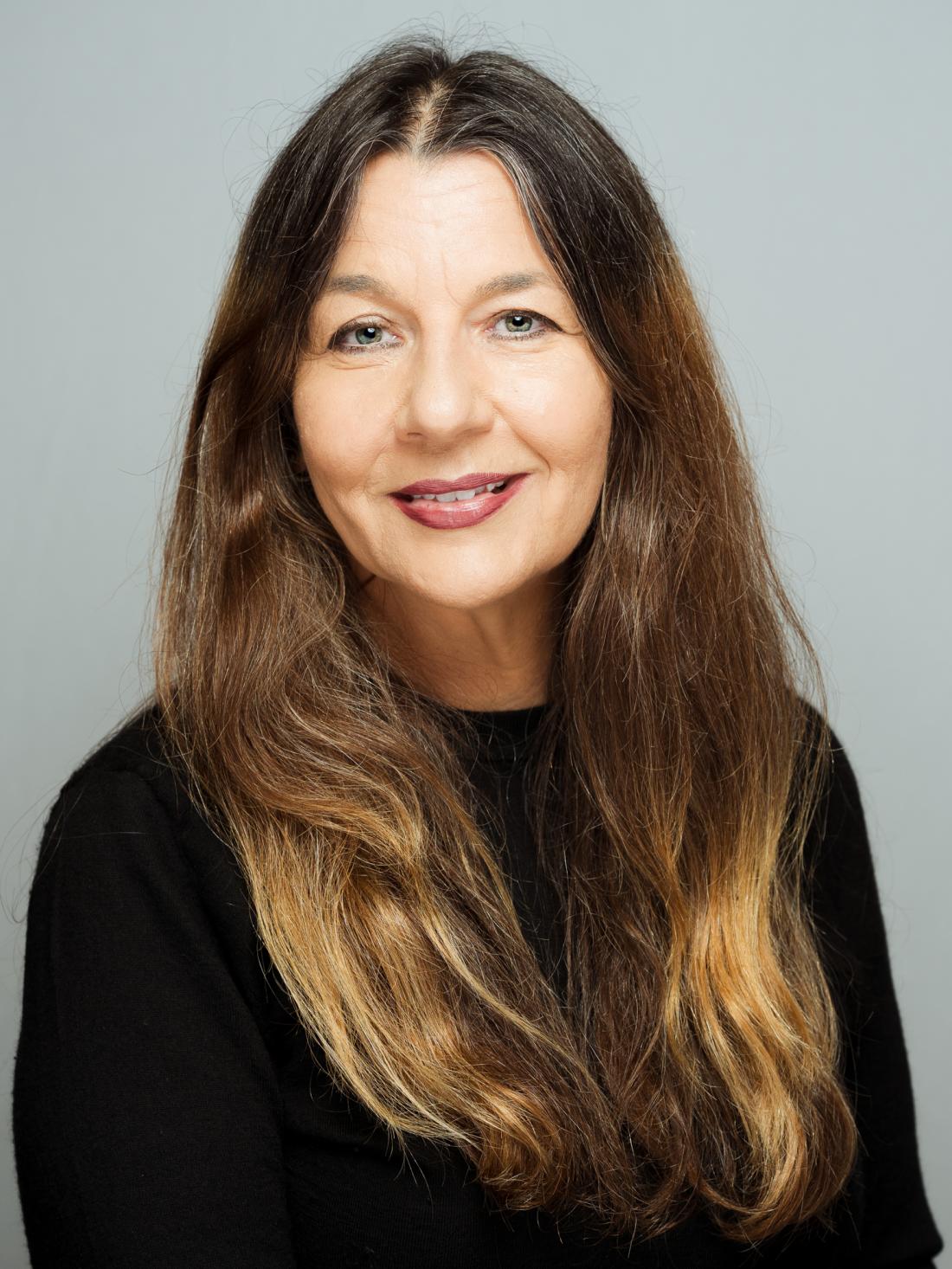 Headshot of Adjunct Professor Jennifer Penton against a white backdrop