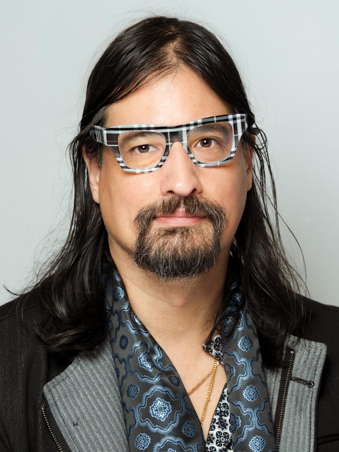 Headshot of Professor Christopher Rossiter against a white backdrop
