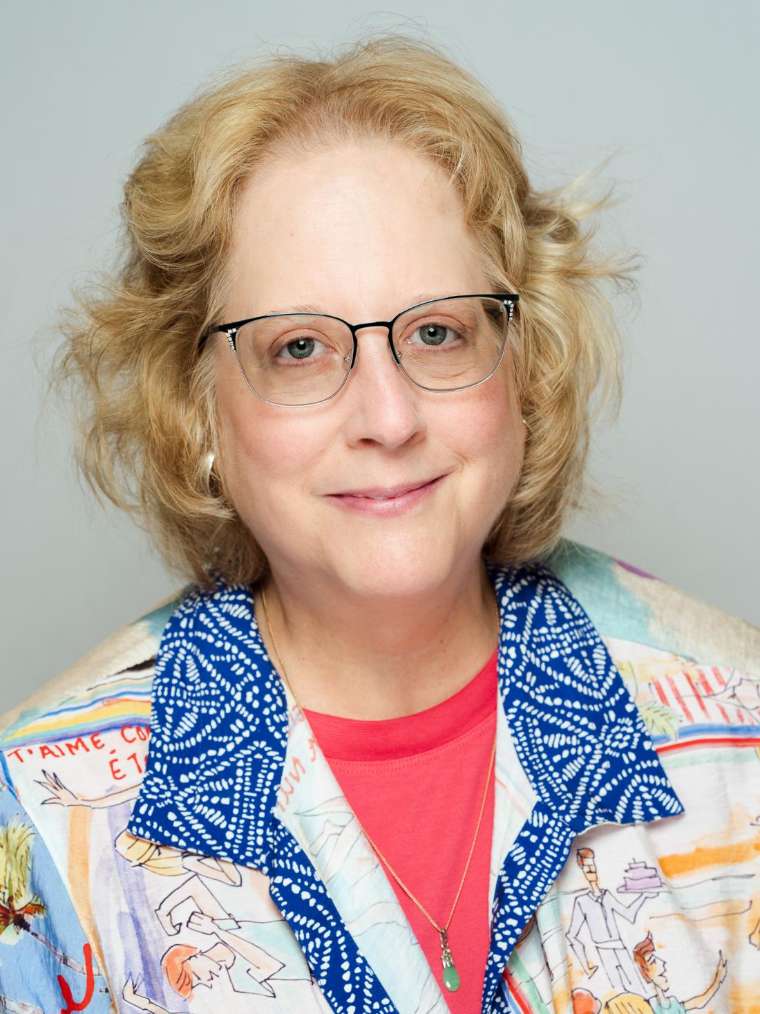 Medium headshot of Professor Joni Varner against a white backdrop